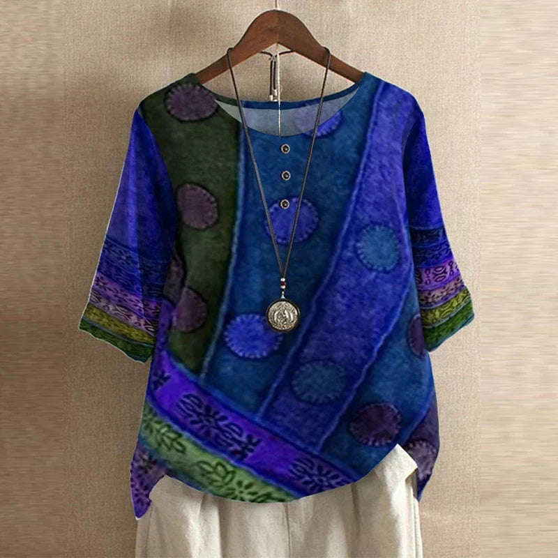 Blouse Anya™ Danoir Paris, style rétro avec détails élégants, en tissu fluide et couleurs vives, vue de face.