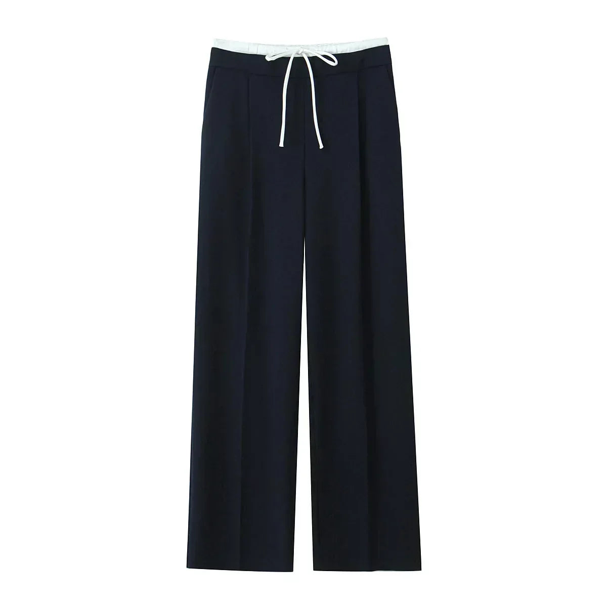 Pantalon Manon de Danoir Paris en tissu noir avec coupe élégante et ceinture à boucle, porté sur un mannequin.