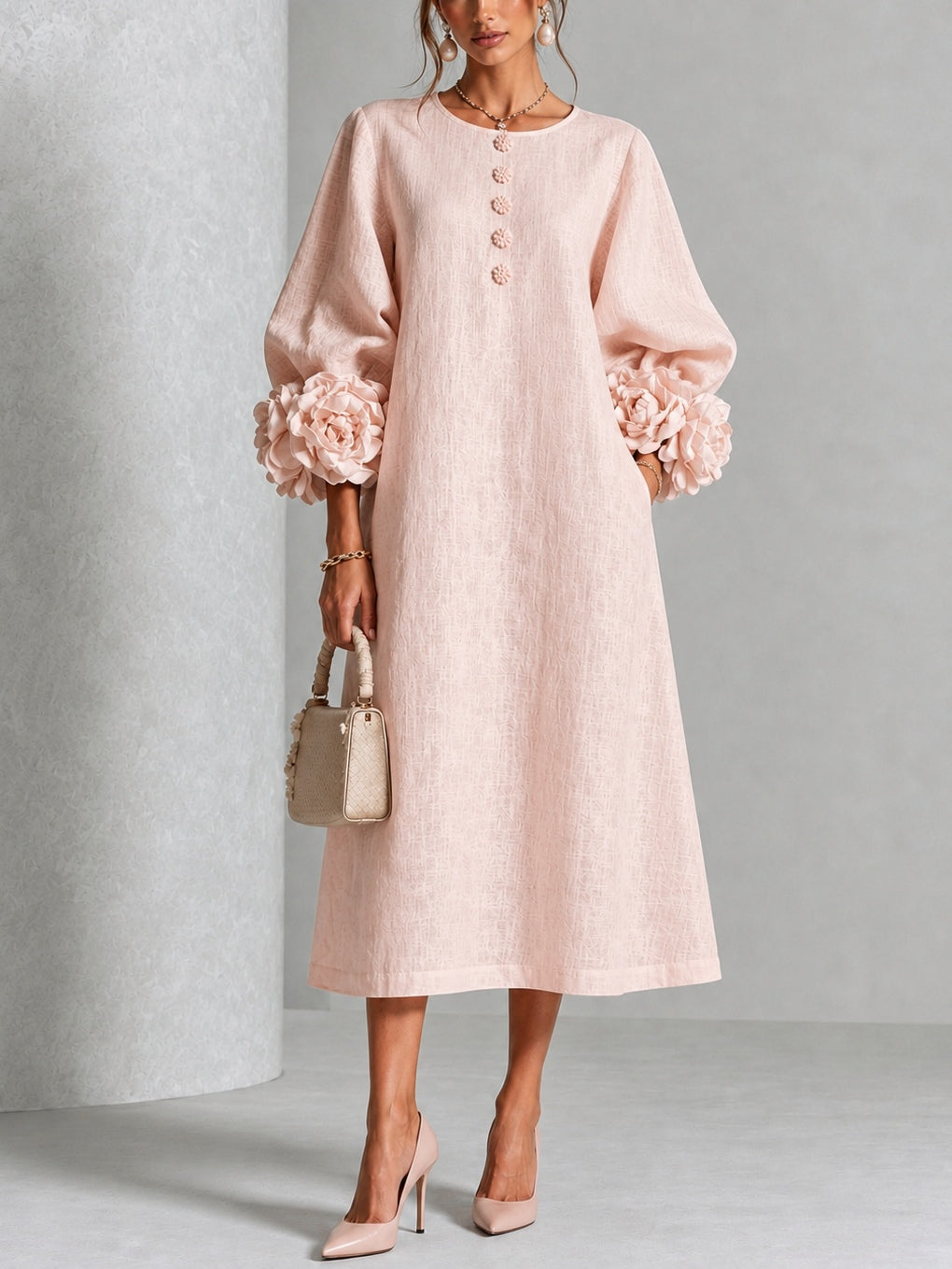 Robe midi florale rose Danoir Paris avec boutons et manches fantaisie, tissu léger et élégant pour femme.