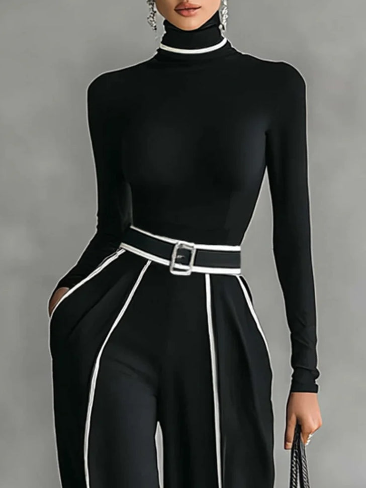 Robe élégante Emma de Danoir Paris avec col montant et pantalon large, vue de face sur fond neutre.