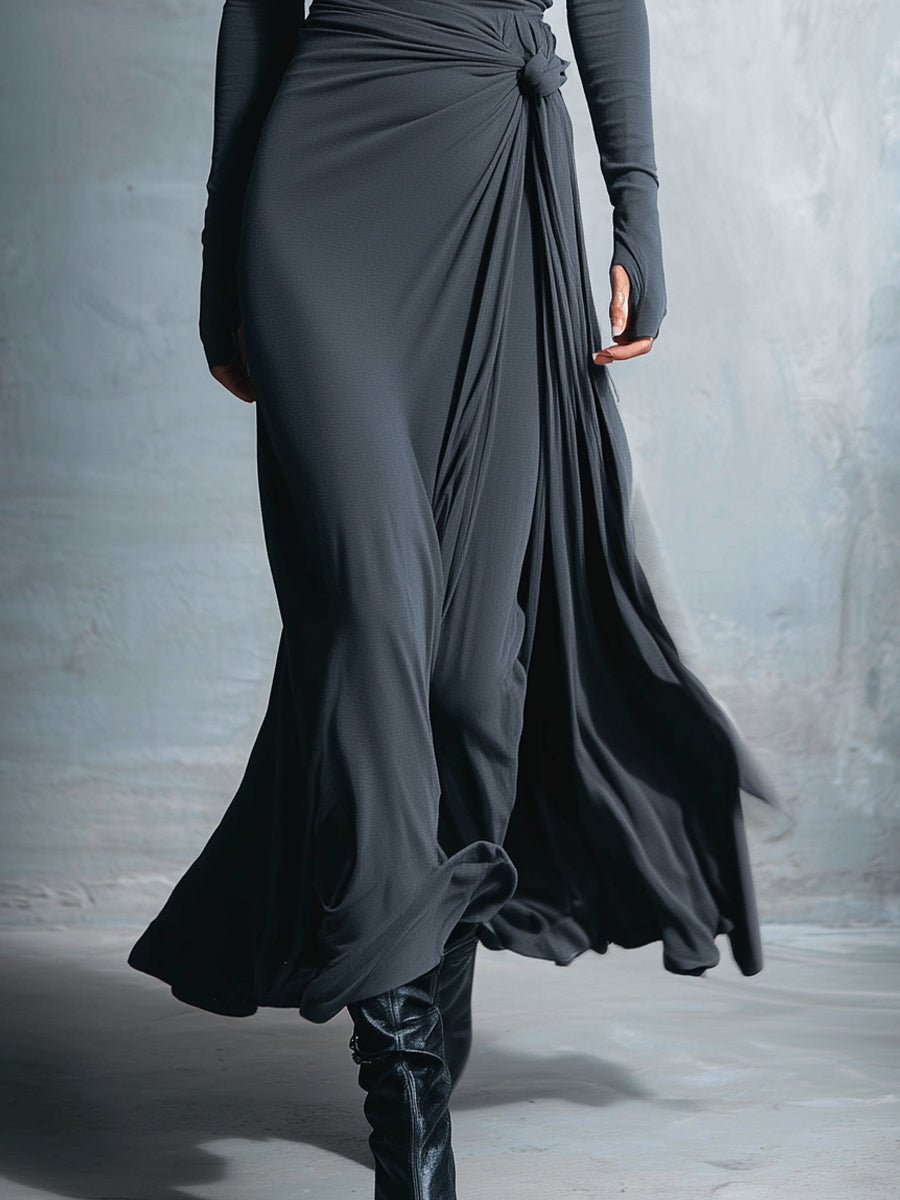 Robe longue Naomie de Danoir Paris, robe maxi avec nœud latéral en tissu fluide et élégant.
