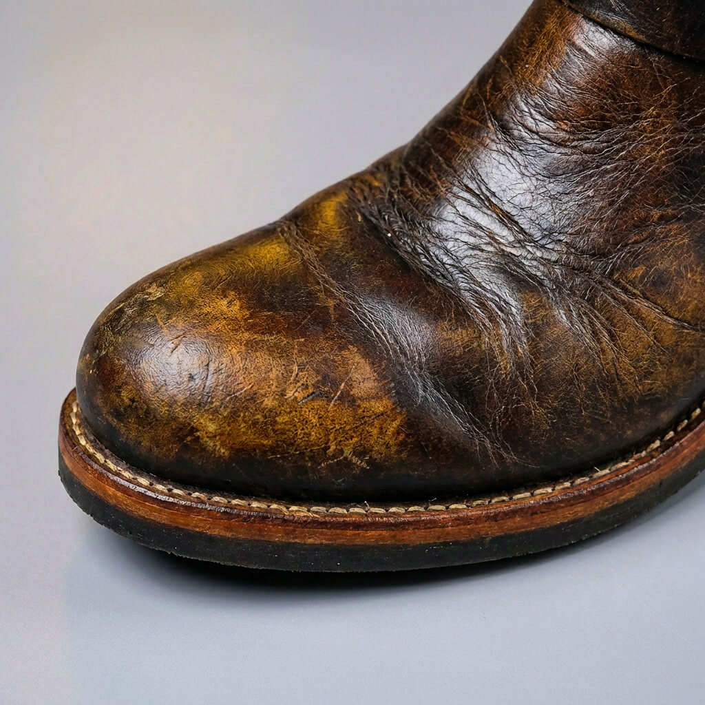 Bottes en cuir vintage Bancroft de Danoir Paris, élégantes et classiques, avec une finition en cuir patiné et une silhouette sophistiquée