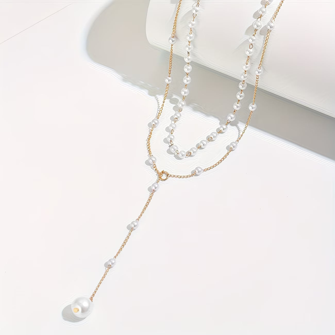 Le collier de perles dégradées