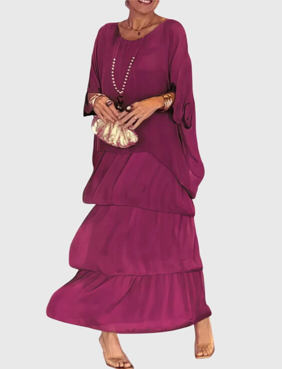 Robe longue Susan de Danoir Paris, style élégant, en tissu fluide, portée avec des détails sophistiqués, vue de face