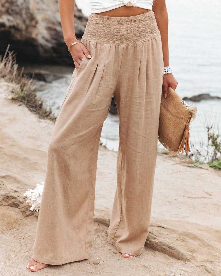 Pantalons larges beige Zayrah de la collection #844 par Danoir Paris, vue de face, tissu fluide et élégance chic.