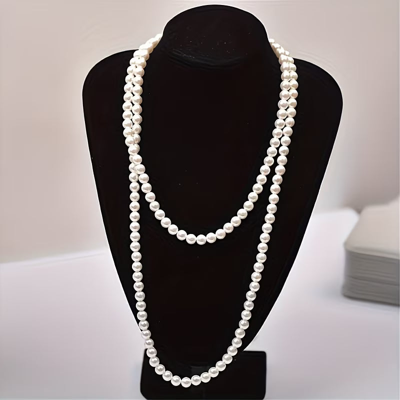 Collier double de perles intemporel de la collection Danoir Paris, avec perles blanches élégantes et fini raffiné.