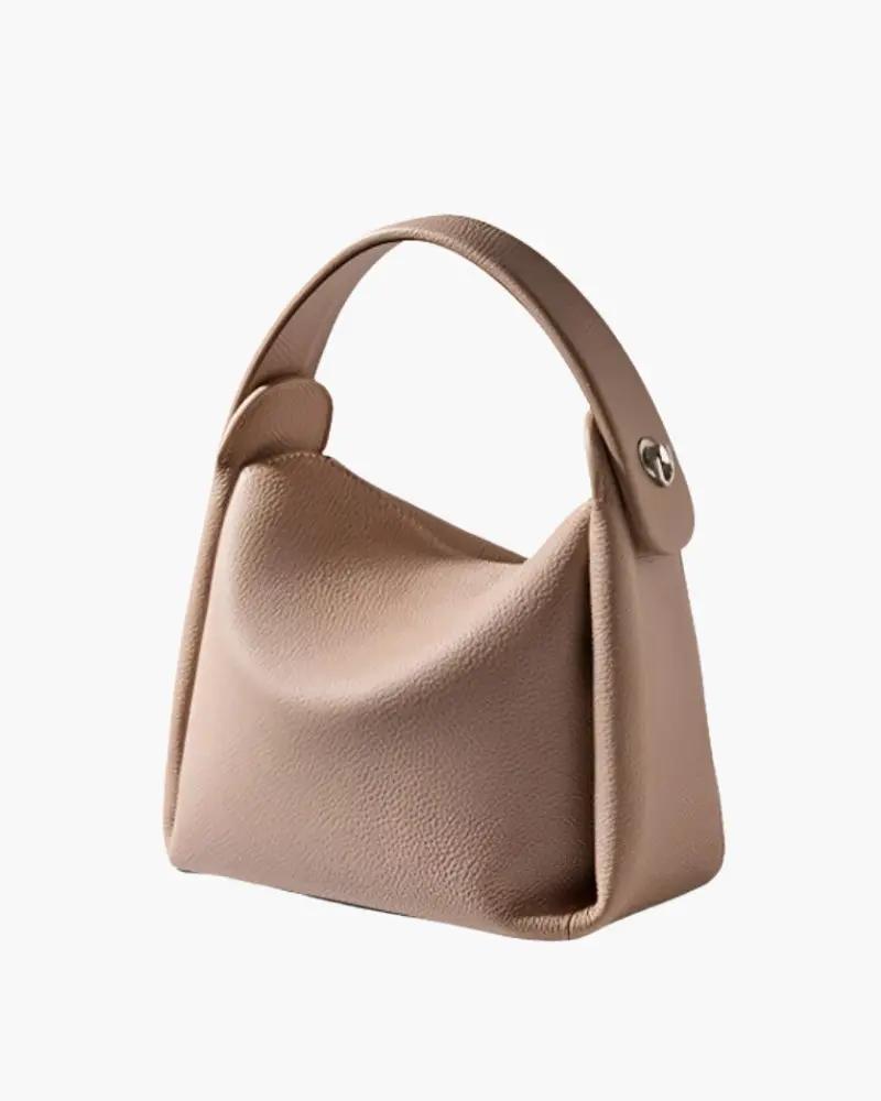 Sac à main élégant pour femme Danoir Paris, design sophistiqué en cuir avec poignées et détails raffinés.
