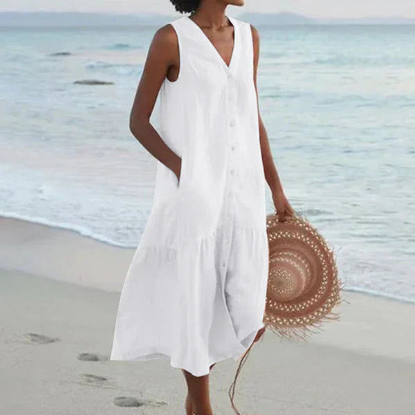 Robe chemise d'été Danoir Paris en coton léger, sans manches, décontractée avec poches, col en V et taille loose, idéale pour la plage.