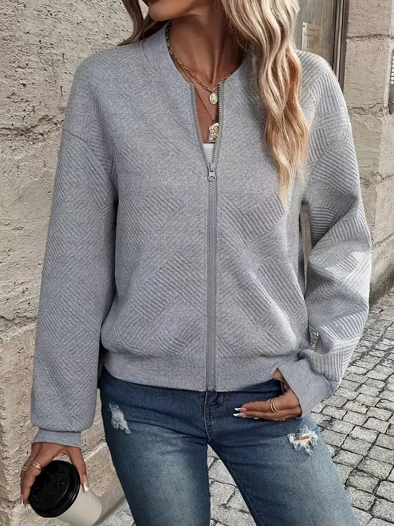 Veste printanière élégante Jennita beige de Danoir Paris, veste légère avec design raffiné et style chic pour la saison.
