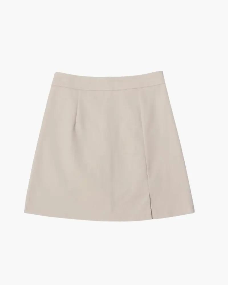 Mini jupe droite Oxford beige Danoir Paris, coupe courte avec détails élégants, vue de face.
