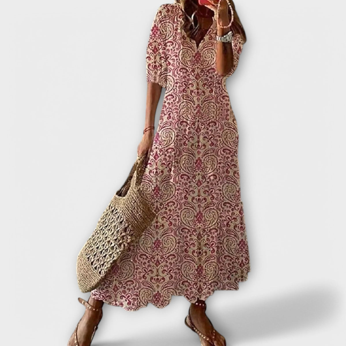 Robe longue maxi Savannah de Danoir Paris en tissu rose vif, avec style élégant et coupe fluide.