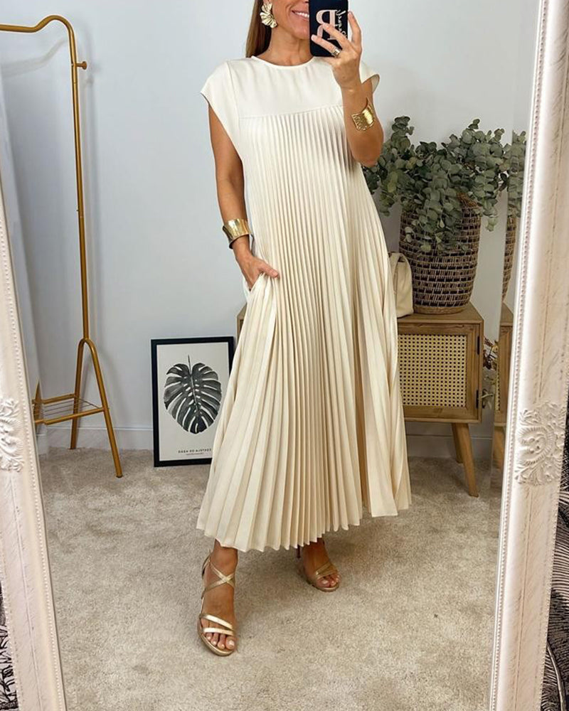 Robe longue élégante Sylvie de Danoir Paris en tissu beige, vue de face avec détails sophistiqués.