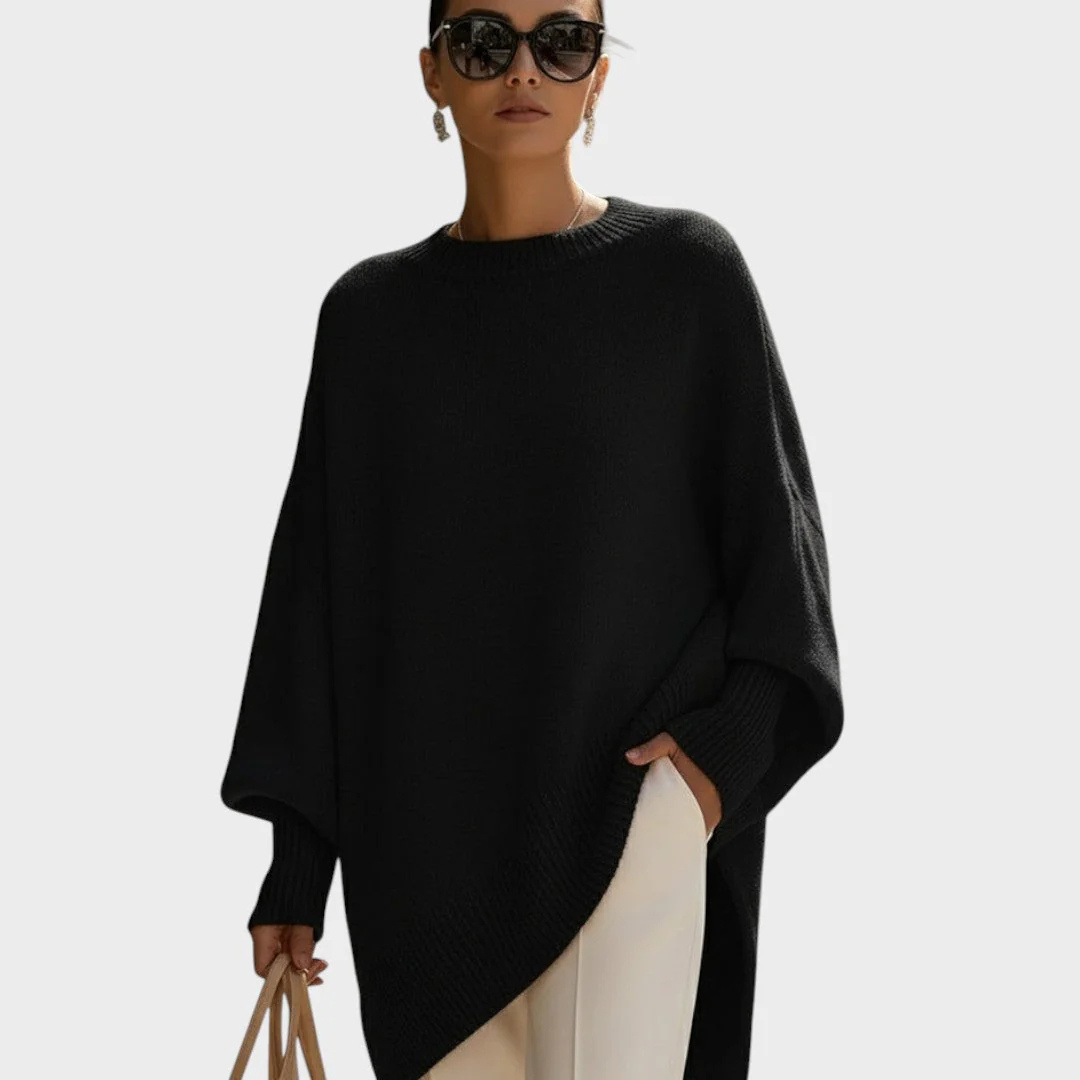 Pull Danoir Paris en maille douce, coupe classique, couleur gris clair, porté sur un mannequin.