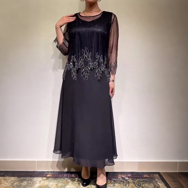 Robe midi décontractée et élégante de Danoir Paris en tissu noir, adaptée pour un style casual et tendance.