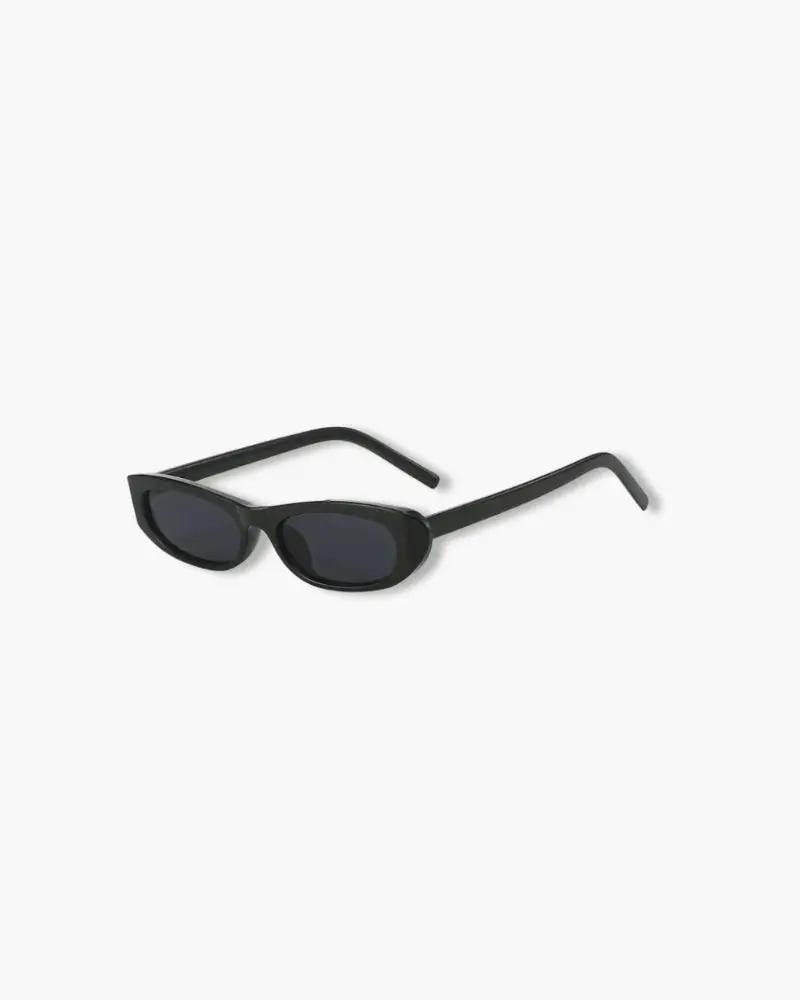 Lunettes de soleil ovales Sylvie de Danoir Paris avec monture en acétate et verres teintés en brun.