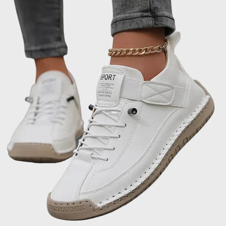 Chaussures de sport confortables et soutenantes Danoir Paris™, sneakers en cuir blanc avec semelle antidérapante et design moderne.