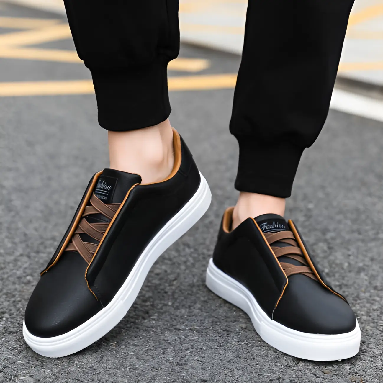 Sneakers chic Danoir Paris Bernardo™ en noir et marron avec semelle blanche, vue de face sur fond blanc