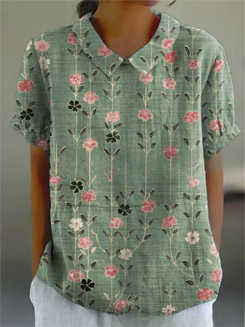 Chemise fleurie élégante Sofia de Danoir Paris, tissu léger avec motif floral pour un style sophistiqué et féminin.