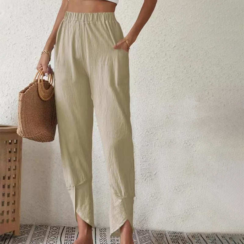Pantalons à ourlet effiloché Danoir Paris, style décontracté avec finition effilochée, en tissu léger et confortable.