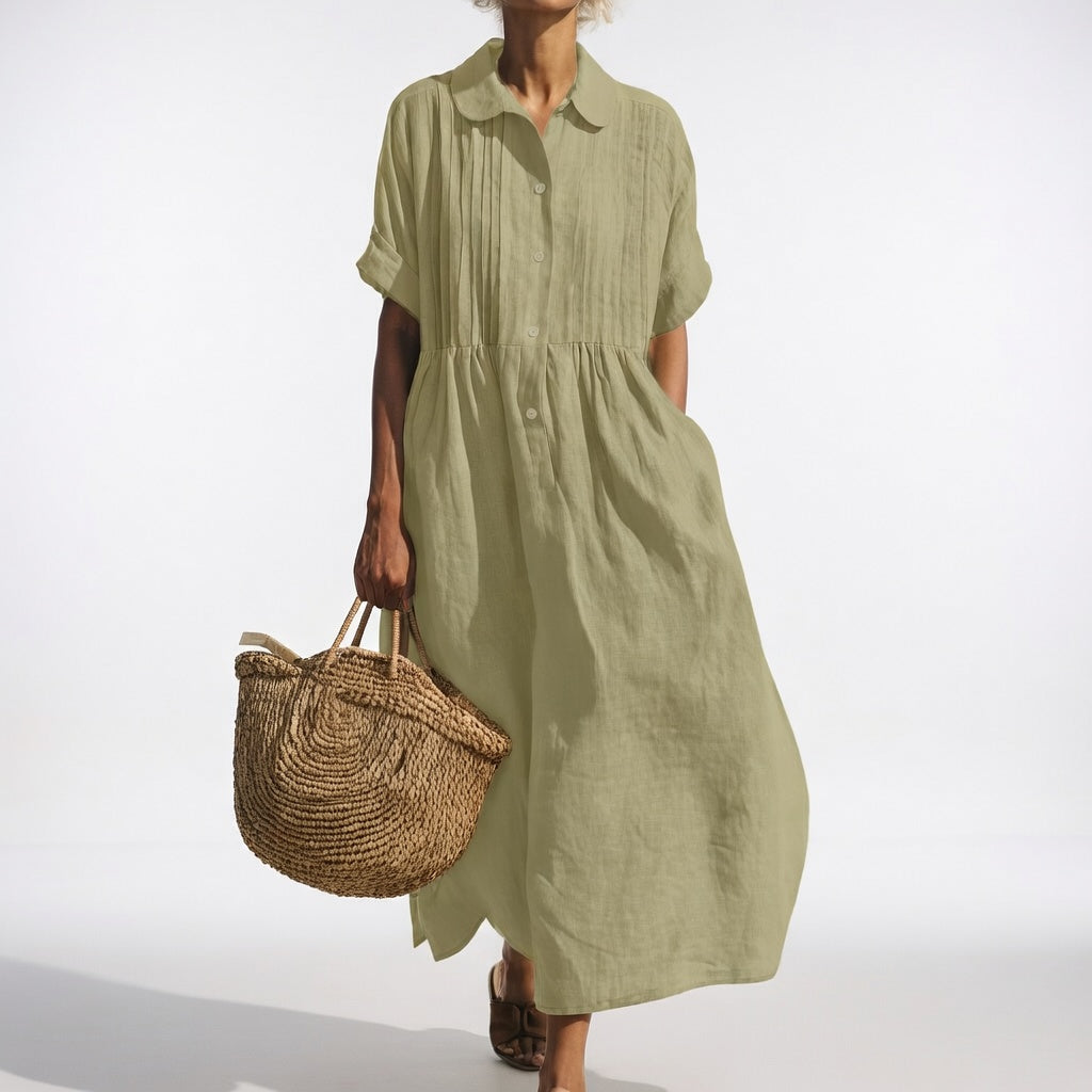 Robe chemise fluide estivale Lysandra™ de Danoir Paris, tissu léger blanc, parfait pour la saison chaude.