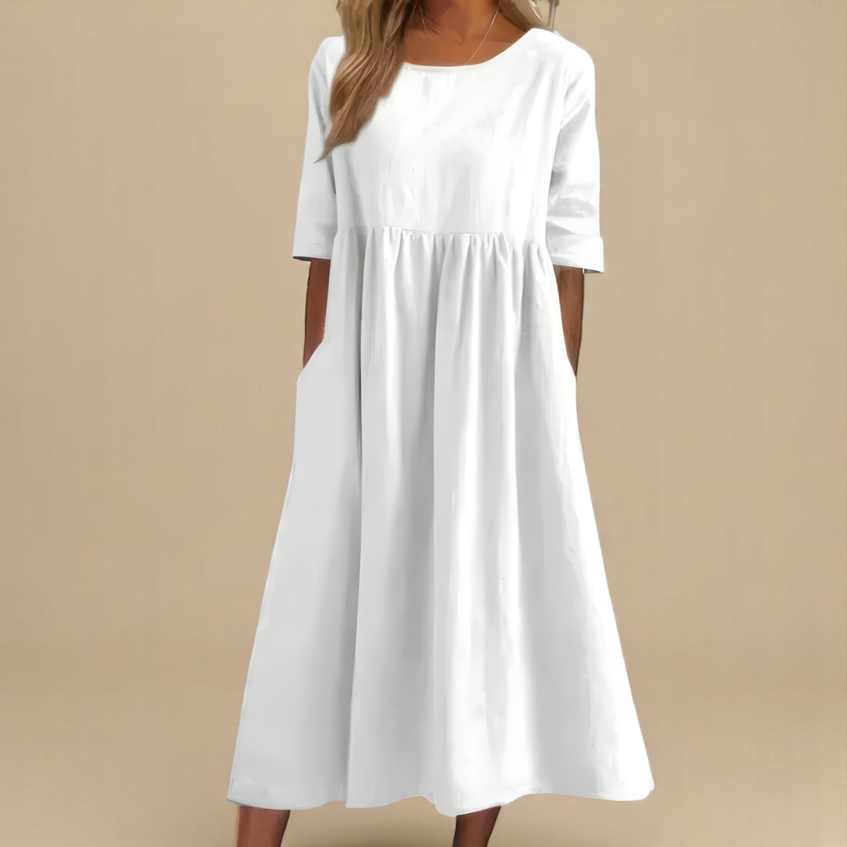 Robe en coton aérée Inaya de Danoir Paris, couleur bleu ciel, tissu léger et confortable, portée décontractée et élégante.