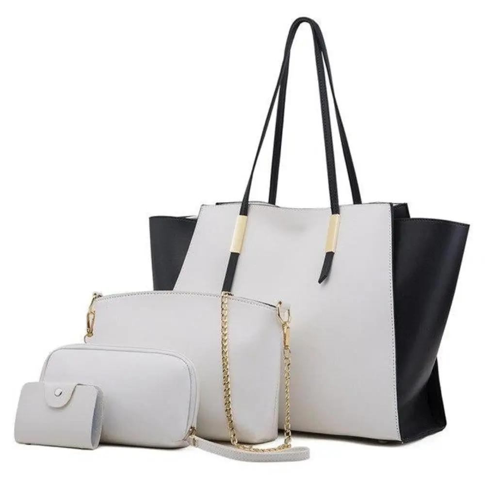 Quatre sacs de shopping élégants et luxueux Danoir Paris, sacs en tissu sophistiqués avec poignées pour shopping chic.