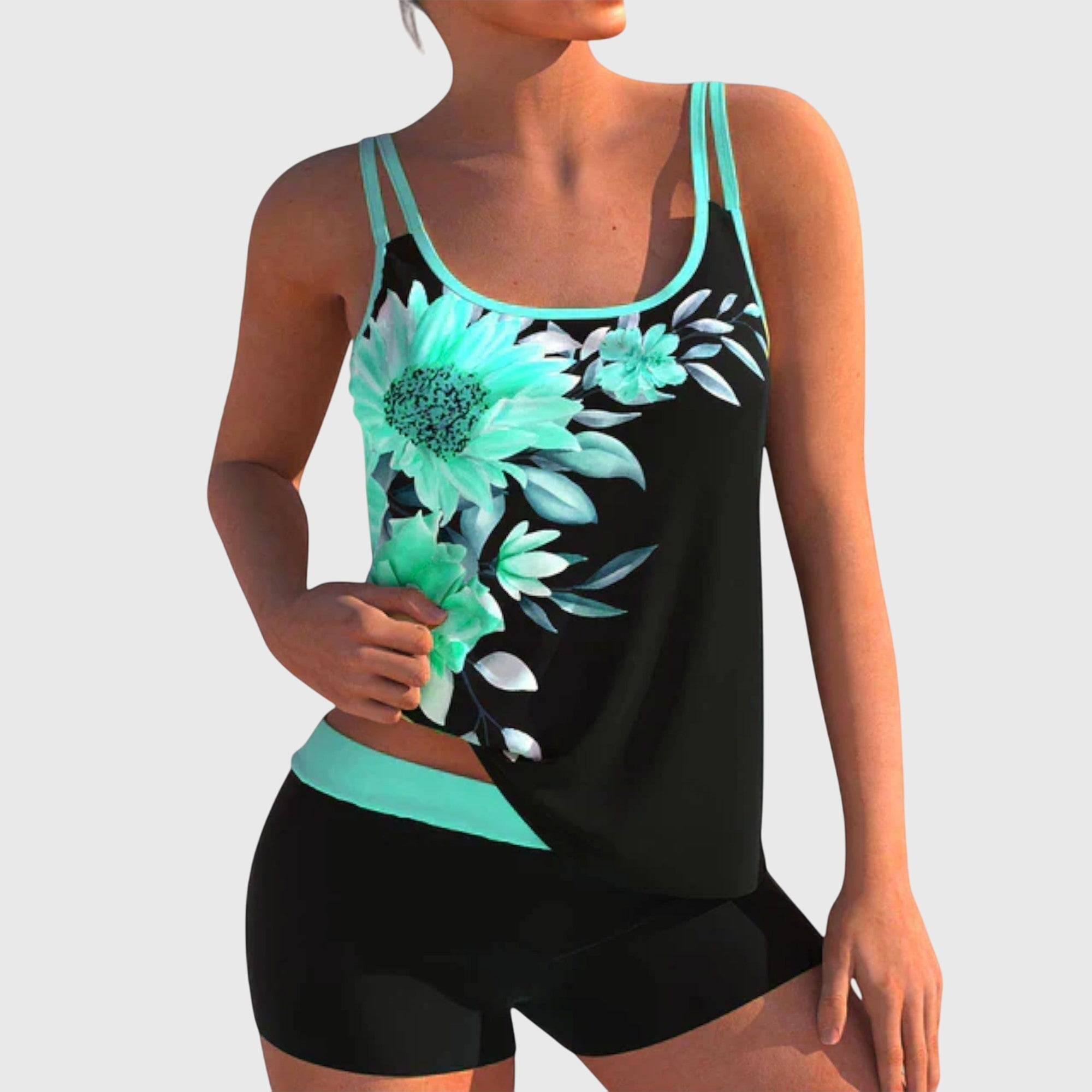 Maillot de bain deux pièces Alice de Danoir Paris, style élégant avec motifs colorés, porté sur la plage.