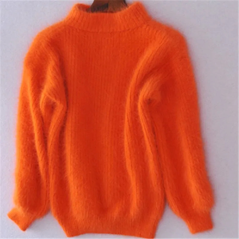 Pull roulé élégant froid Danoir Paris Jessica en bleu, détail du tissu et du col roulé pour un look sophistiqué.