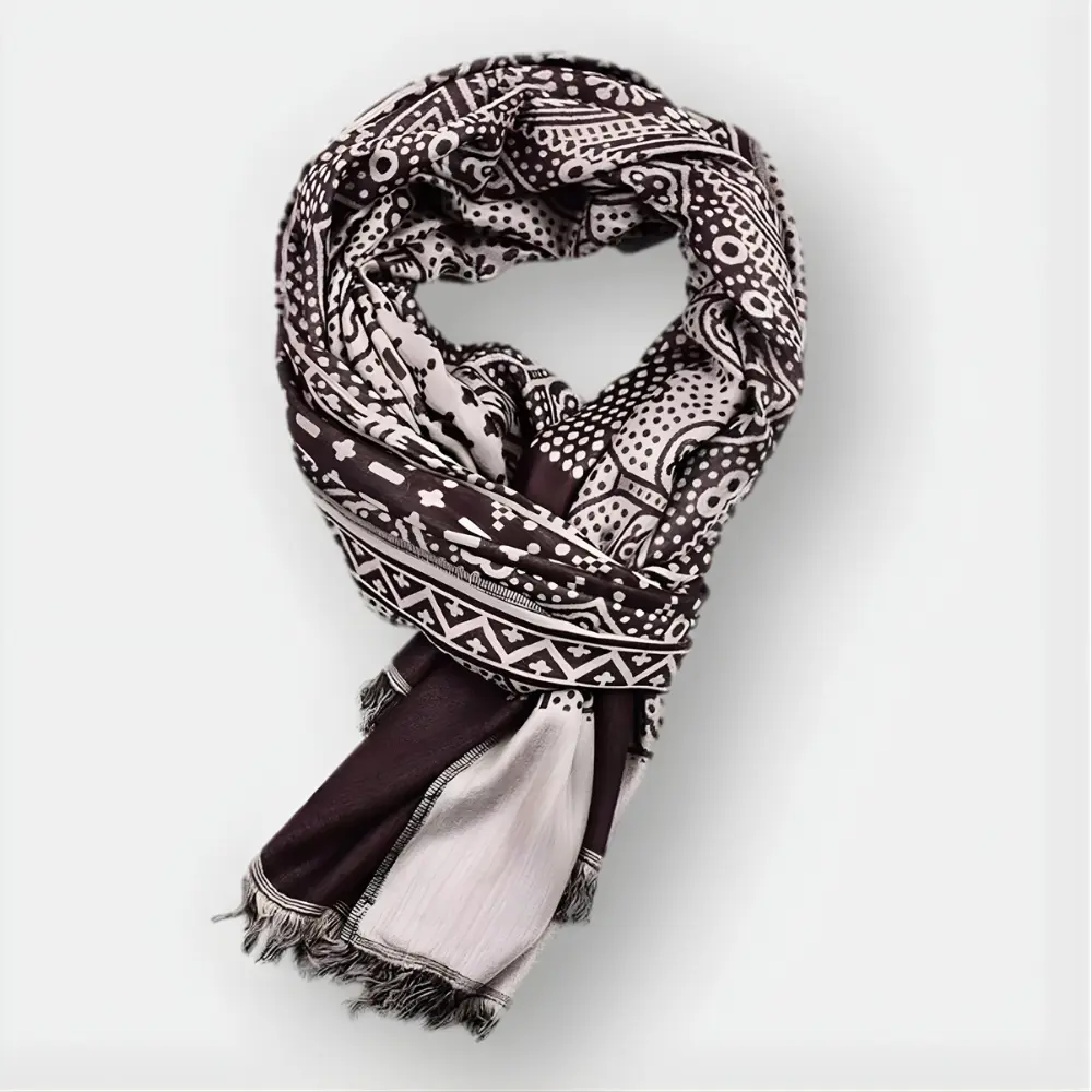 Écharpe en coton vintage Thibault™ de Danoir Paris avec motifs colorés, portée enroulée autour du cou.