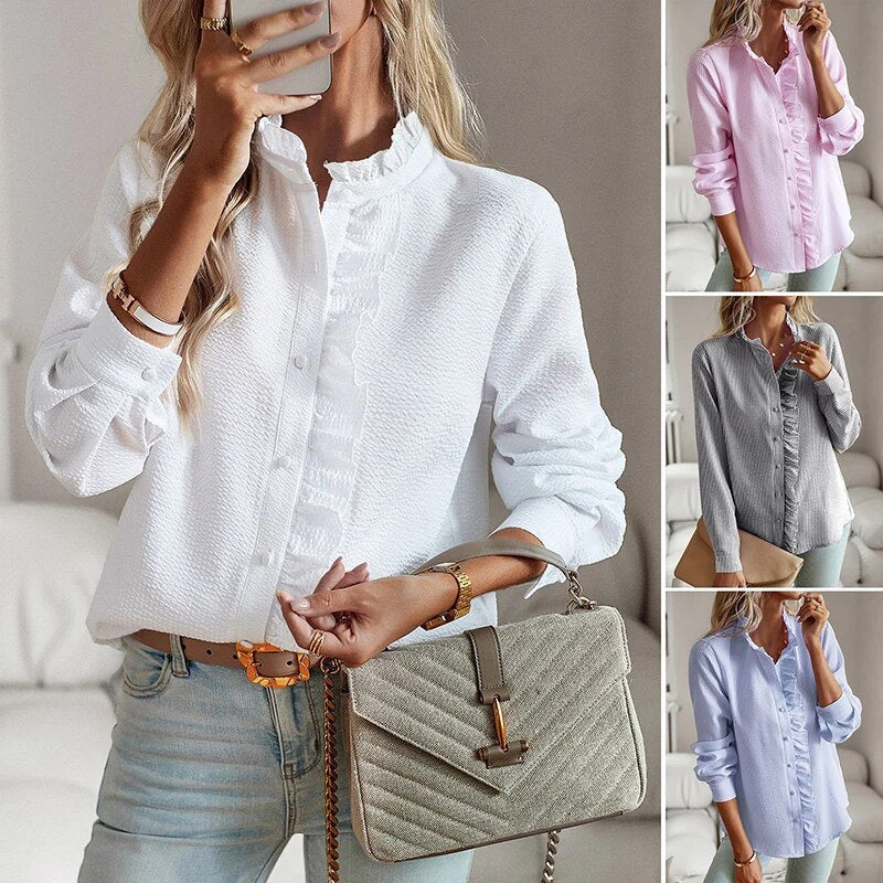 Chemise élégante Danoir Paris pour femmes, avec col montant, manches bouffantes et style simple pour bureau.