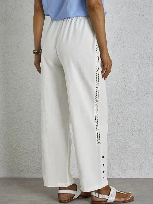 Pantalons relaxés Danoir Paris Shania avec boutons, coupe décontractée et détails tendance, en tissu doux et confortable.