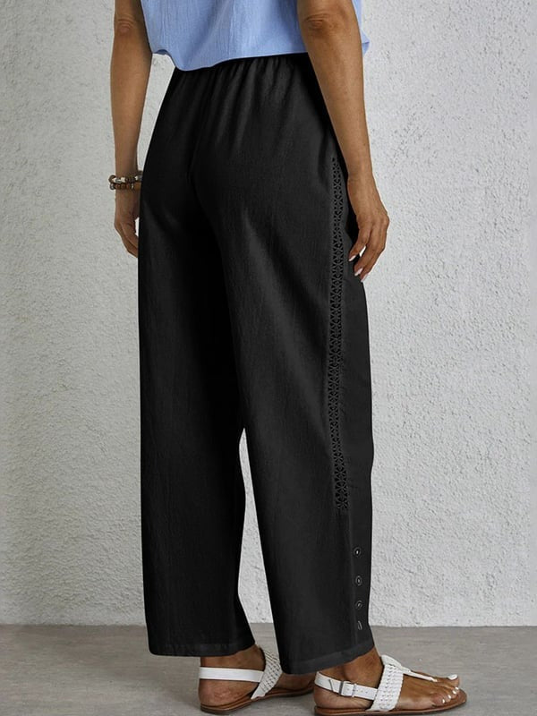 Pantalons relaxés Danoir Paris Shania avec boutons, style décontracté et confortable, en tissu léger.