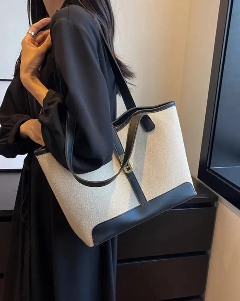 Sac à épaule Danoir Paris St Tropez avec détails en cuir et poignées, vue de face sur fond neutre.
