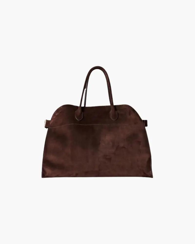Sac en velours et henné Danoir Paris, élégant sac à main en tissu velouté avec détails en henné.
