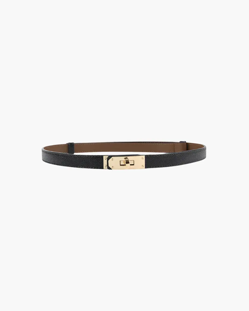 Ceinture slim vintage Danoir Paris en cuir marron avec boucle métallique élégante et détails raffinés.