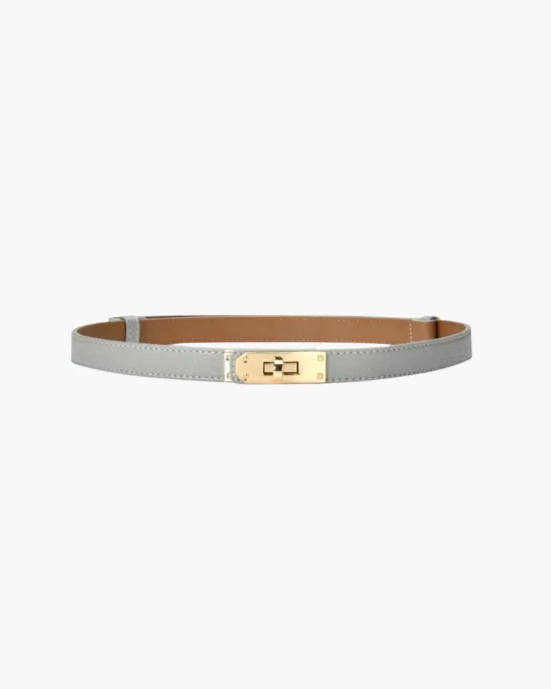 Ceinture slim vintage Danoir Paris en cuir noir avec boucle métallique, portée autour de la taille.