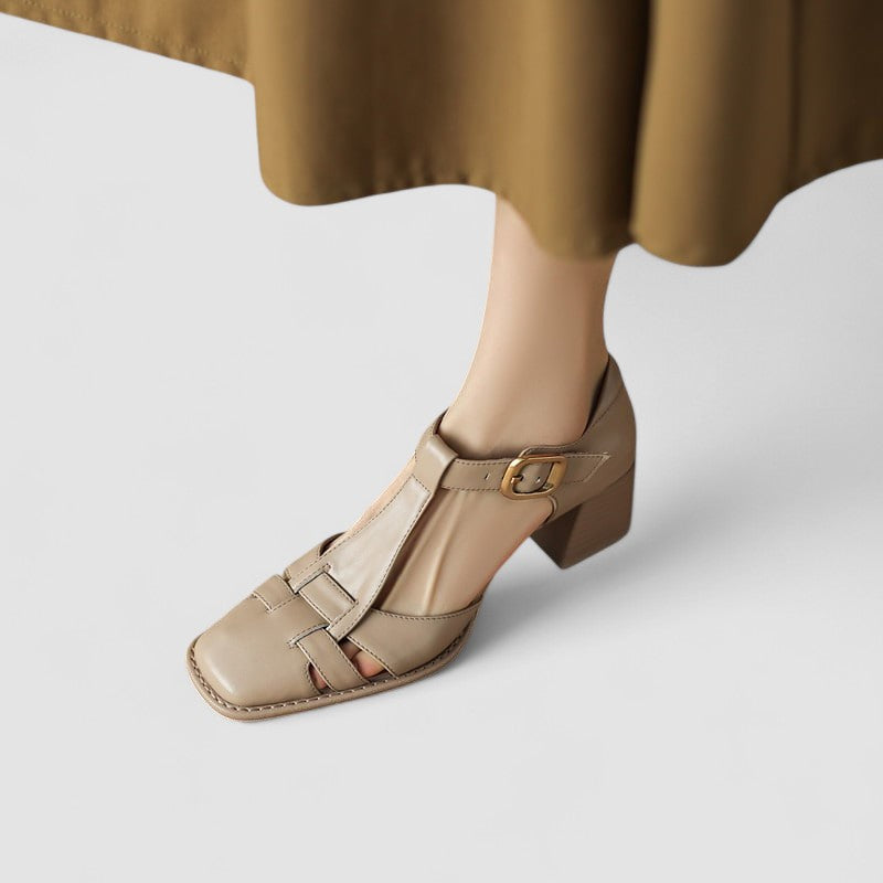 Danoir Paris Victoire™ bébés, découpes latérales en brun, design élégant pour vêtements pour enfants.