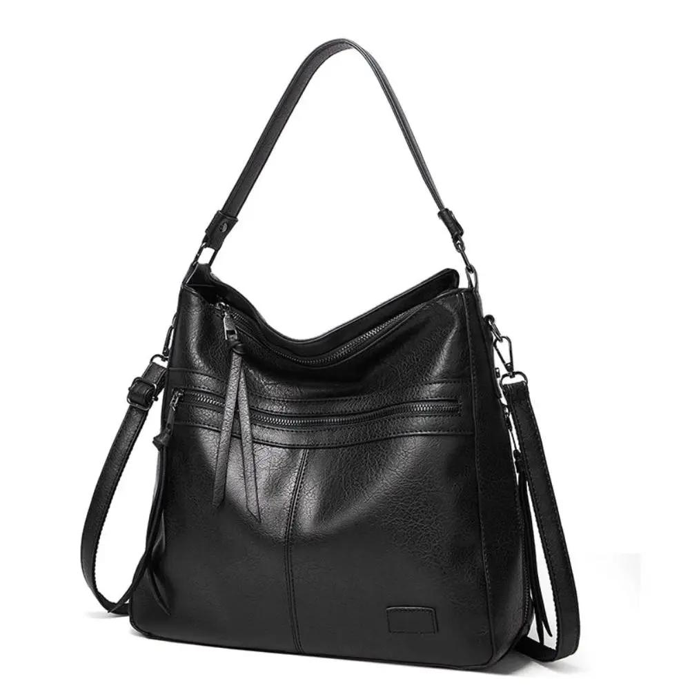 Sac Danoir Paris Lilla, sac opulent au design intemporel en cuir avec détails élégants et finition raffinée.