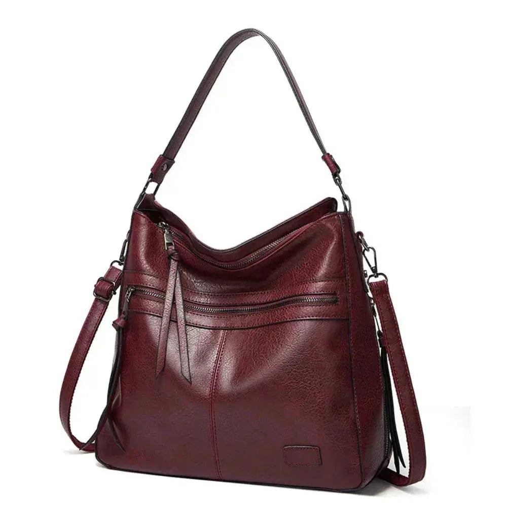 Sac Danoir Paris Lilla, sac opulent au design intemporel en cuir élégant, avec détails sophistiqués et finition soignée.