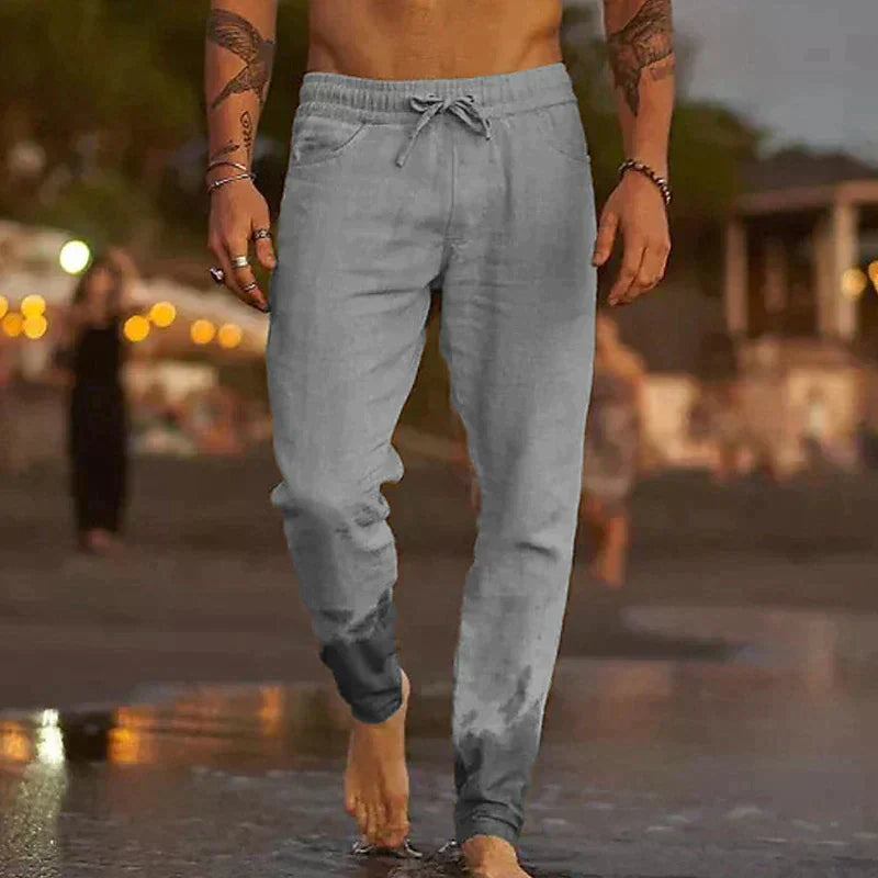 Pantalons de plage en lin Mateo de Danoir Paris, coupe décontractée et tissu léger, parfaits pour l'été.