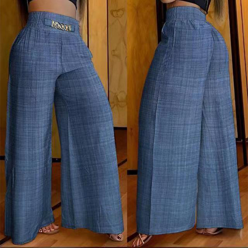Pantalon large taille haute sculptant Évelyne™ de Danoir Paris, en tissu noir, porté avec une blouse blanche, vue de face.