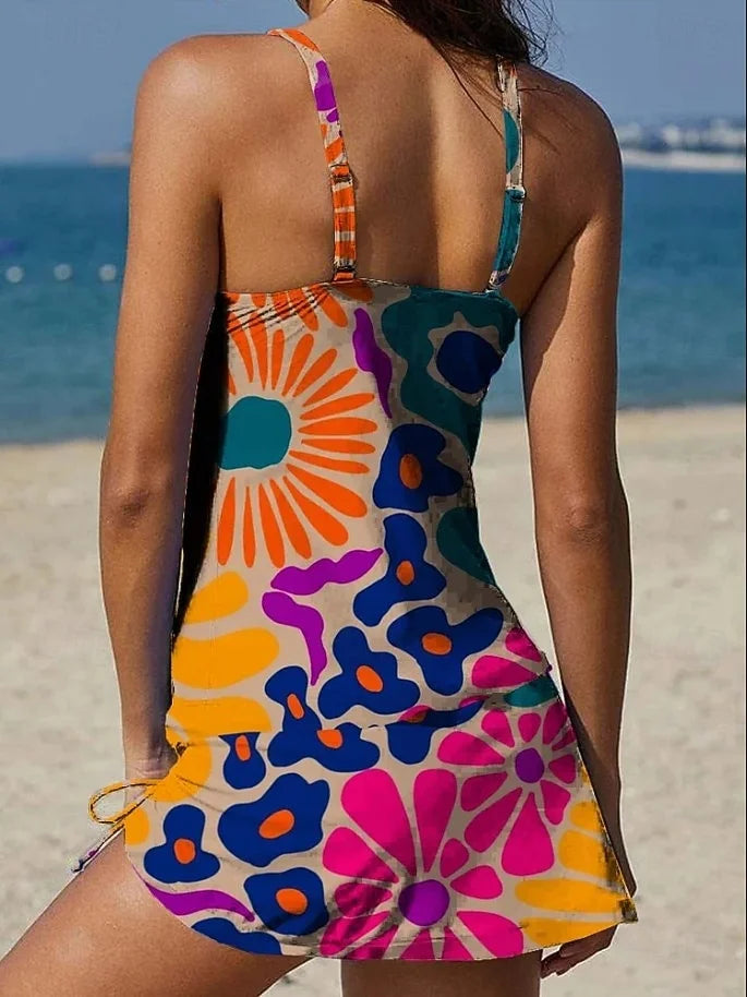 Tankini floral graphique orange Danoir Paris avec shorts, effet ventre plat, costume de bain deux pièces.