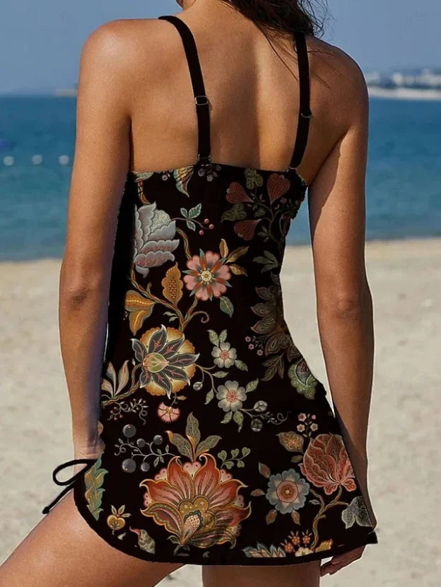 Tankini floral graphique orange Danoir Paris avec shorts, effet gainant et support pour un maillot de bain tendance et confortable.