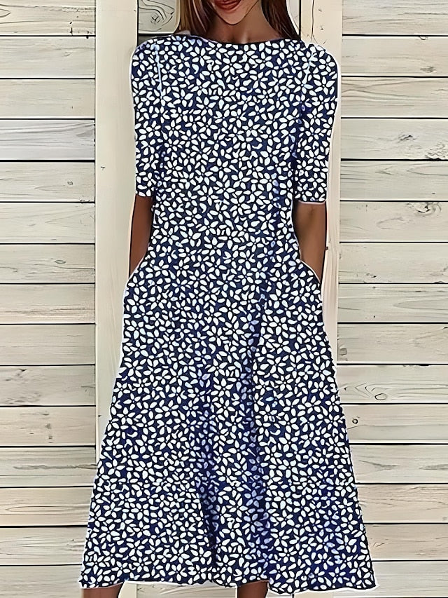 Robe d'été élégante Danoir Paris Sela avec tissu léger, coupe fluide et détails raffinés, portée sur mannequin blanc.
