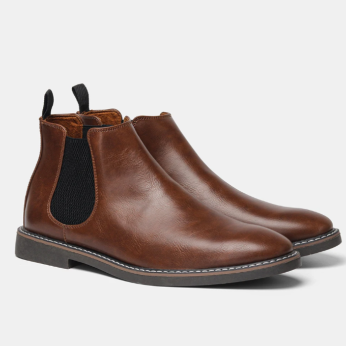 Chaussures Chelsea Danoir Paris™ en cuir noir avec semelle épaisse et elastiques latéraux, vues de profil sur fond neutre.