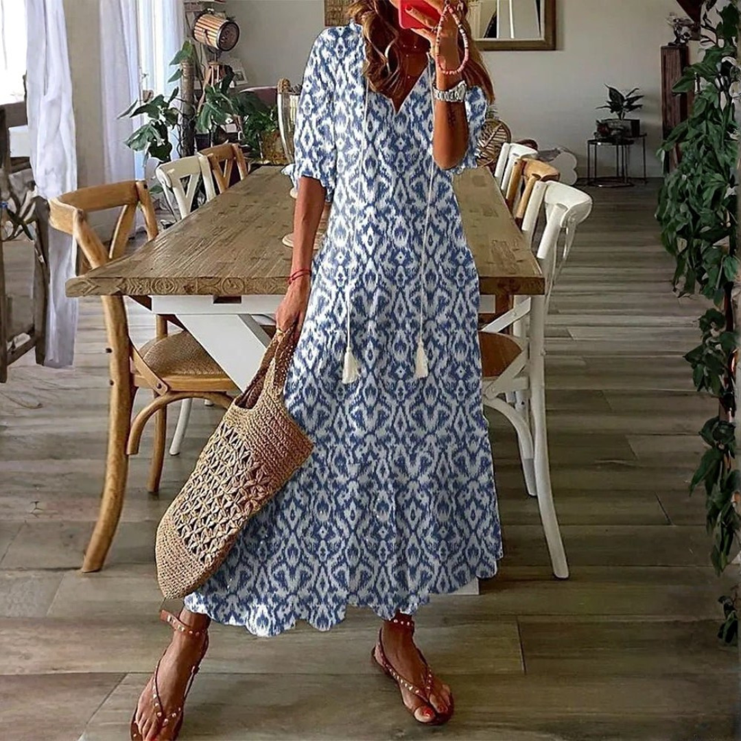 Robe midi boho Danoir Paris Luna sans effort, tissu léger et fluide, style décontracté avec motifs floraux.
