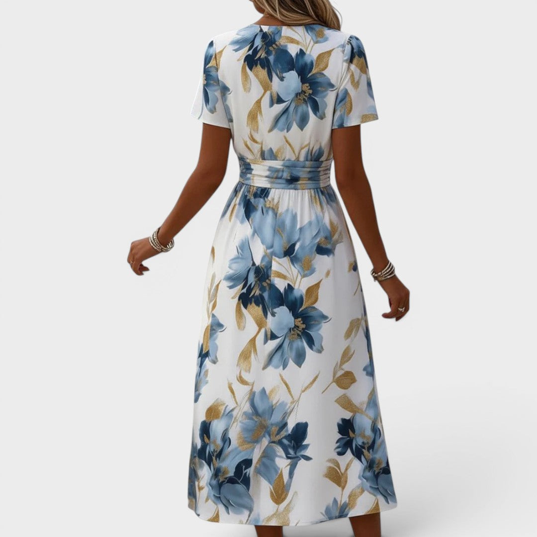 Robe midi Danoir Paris Denise à fleurs, ceinture enroulante, style fluide et coloré, idéale pour une allure élégante et décontractée.