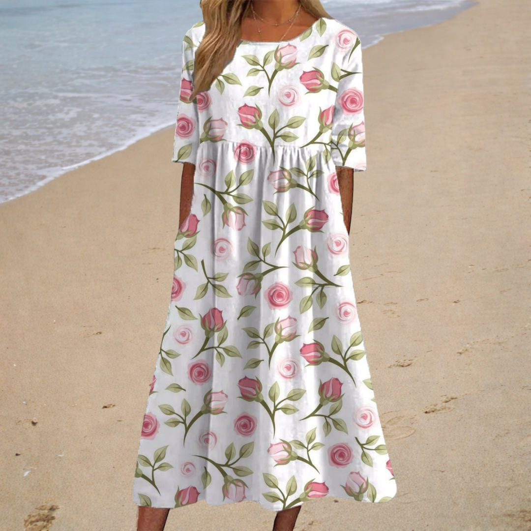 Robe midi romantique Danoir Paris Aurélie, élégante et fluide, avec détails délicats, parfaite pour une tenue sophistiquée.