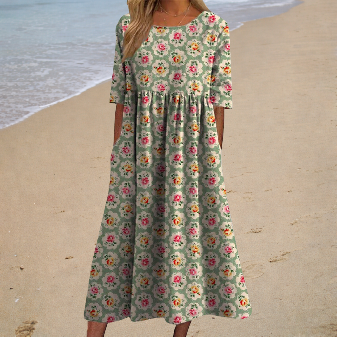 Robe midi romantique Danoir Paris Aurélie, style élégant avec détails floraux en tissu léger, vue de face.