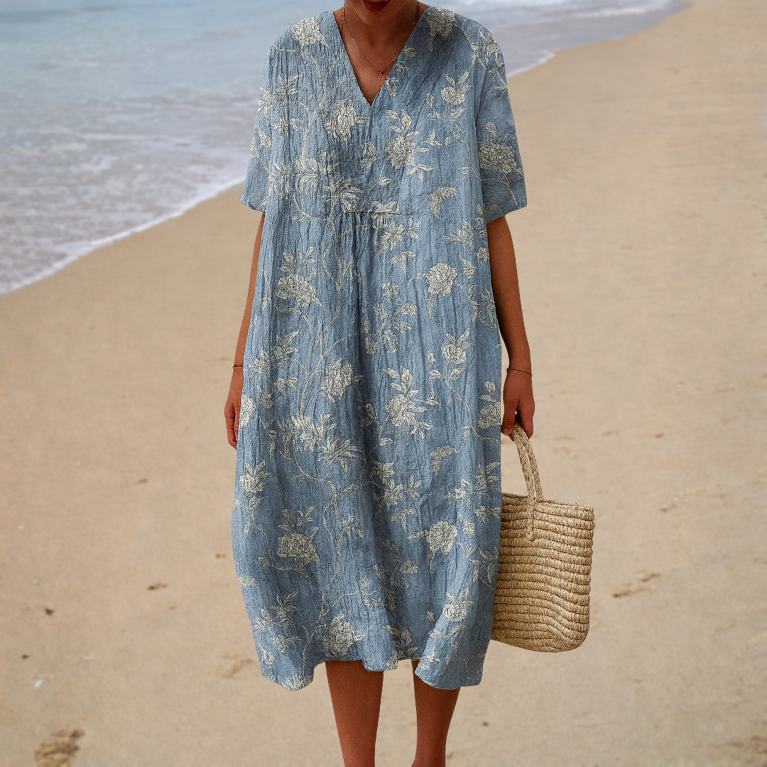 Robe midi bohème Amandine de Danoir Paris avec motifs floraux, manches longues et coupe fluide, parfaite pour un style décontracté.